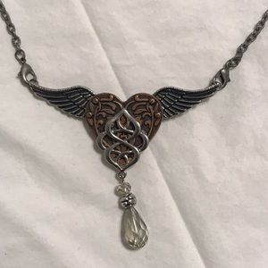 Bronze heart with silver wings necklace